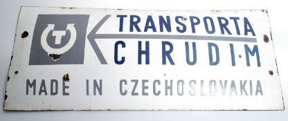 A mid century Industrial enamel advertising sign of Czech origin. White ground with notation for