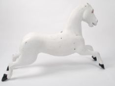 An original 1950's / mid century fairground carousel horse of composite construction in the white