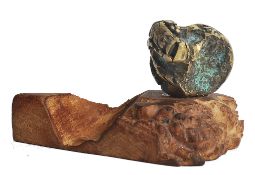 A 20th century bronze sculpture by David Morris. The later wooden plinth  supporting an unusual