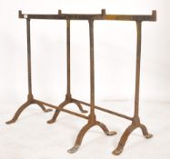 A pair of mid century Industrial trestle ends of cast metal and wooden construction - ideal as