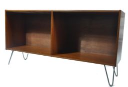 A vintage 20th century retro teak wood G-Plan double window bookcase cabinet being raised on hairpin