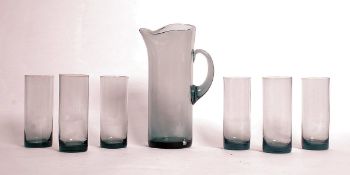 A vintage retro mid 20th century smokey glass lemonade set by Alsterfors consisting of a tall jug