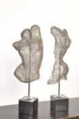 A male and female pair of sculptures construceted