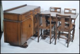 A 1940's post war Art Deco dining room suite compr