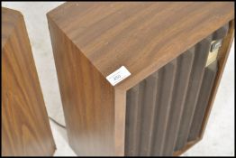 A pair of Winthrop vintage speakers model no KB14. Each of upright form having ridged facia to each
