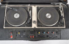 A set of vintage 1970's DJ Decks - record player by being complete in the carry case. The silvered