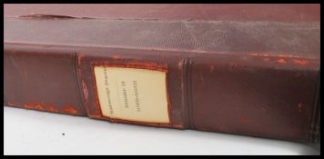 A 19th century leather spined book form print box of large form having notation panel in morocco