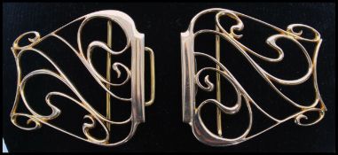 An early 20th century Victorian hallmarked 9ct gold nurses nurse belt buckle clasp having a