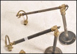 A set of 3 antique style 20th century wall mounted anglepoise lamps. Each with twin arms having