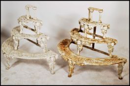 A rare pair of 19th cenury Coalbrookdale manner 4 tiered cast iron lattice and pierced worked