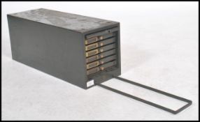 A vintage mid 20th century industrial desk top ind