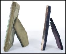 A pair of non matching silver hallmarked easel backed picture frames, each hallmarked to the side.