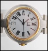 A Gents Dunhill stainless steel quartz watch with bracelet, Roman numeral chapter ring, sweep