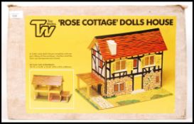 ROSE COTTAGE DOLLS HOUSE