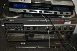 A Hitachi TV FM MW?LW stereo radio cassette recorder along with a Waltham Stereo Cassette recorder