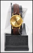 A collection of ladies and gents vintage 20th century watches to include watches by Curtiss,