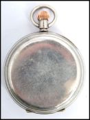 A silver plated Swiss made lever open faced crown wind pocket watch, having enamel face with Roman