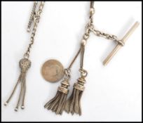 A 19th century silver Continental white metal ladies chatelaine measuring 25.5cm in length and