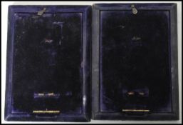 A pair of early 20th century Edwardian silver hallmarked picture frames having a blue velvet back