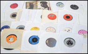 Vinyl Records - A good collection of 45rpm vinyl record singles to include various artists to