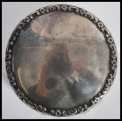 A large early 20th century silver hallmarked topped cut glass dressing table pot. Hallmarked for