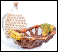 A retro 20th century studio pottery lattice work fat lava style fruit bowl together with a studio