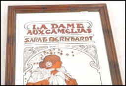 A retro 20th century advertising mirror with transfer printed maiden in the Art Nouveau manner
