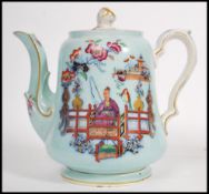 A late 19th early 20th century Staffordshire china teapot, transfer printed with scenes of