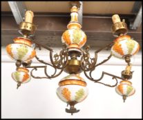 A 20th century Continental five branch brass / ormolu and ceramic light / chandelier light