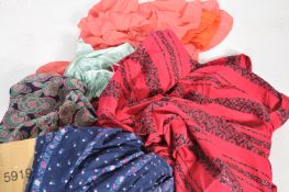 A collection of vintage 1970s retro ladies clothes to include three full length skirts one having