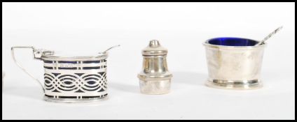 A collection of silver hallmarked table cruets, to include a pair of cruets by Neustadt &