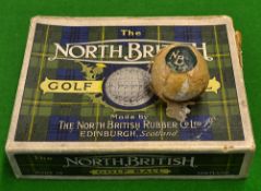 North British square dimple partially wrapped golf ball c/w label and original maker's box for 12.
