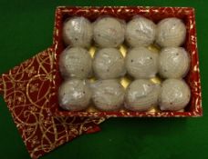 12x Penfold pat wrapped golf balls in the original very decorative velvet style box