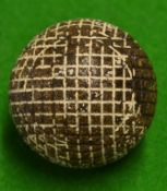 Square mesh pattern guttie golf ball - retaining some white finish believed to be a Woodley Flyer