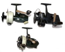 REELS: (3) Abu Cardinal 66 green/cream spinning reel in good working order, foot stamp 060604, a