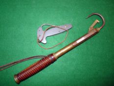 ACCESSORIES: (2) Early Hardy brass extending salmon gaff with oval logo to barrel, decorative turned