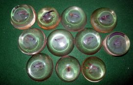 PAPER WEIGHTS: (11) Eleven resin paperweights from 2.5