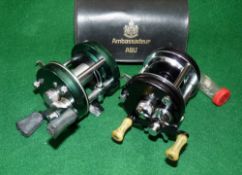 REELS: (2) Abu Ambassadeur 5000C multiplier reel, fine condition, twin white marble handles, 3 screw