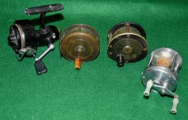 REELS: (4) London style brass on ebonite fly reel with German silver rims, 2.75