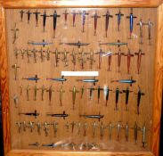 LURE DISPLAY: Collection of vintage classic metal Devon minnow lures, ranging in sizes 1