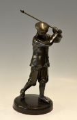 Large spelter golfing figure - mounted on a circular base overall 11.5