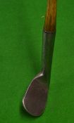 Heavy track iron c.1880 stamped Elvery fitted with an ash shaft and original full length leather