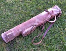 Good early leather pencil golf bag c/w ball pocket, leather sling and carrying handle (G)