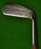 A Spalding Gold Medal iron with a unique wooden shaped end grip section