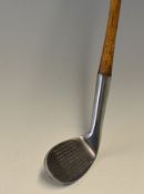 James Gourlay Unusual dish faced small headed niblick with central punch dot face markings