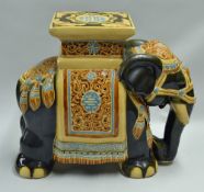 Large Ceramic Elephant Plant Stand decorated in traditional dress, for good luck, brown in light