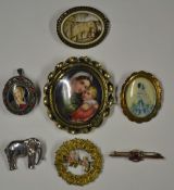 Selection of Various Brooches to include a Victorian pin with ruby, a Madonna brooch, a crinoline