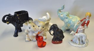 Assorted Selection of Elephant Statues and Ornaments including plant Pots, a Cuddling Elephant