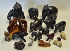 Assorted Elephant Ornamental Selection includes wooden elephants, a pair of bookends, a pair of '