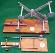 ACCESSORIES: (2) Hardy Practical table top line drier with wood/brass reel seat, stamped 